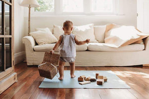 splash mat for kids - stylish leather floor mat by Matte + Moss in 'seabreeze'